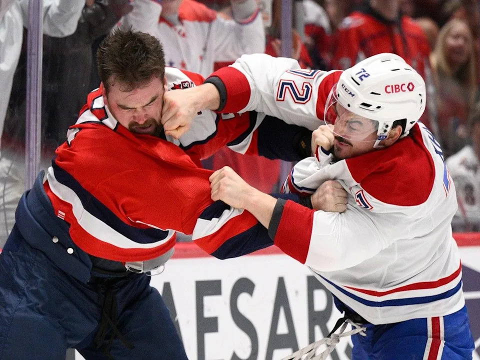  Montreal Canadiens defenceman Arber Xhekaj (72) fights with Washington Capitals defenceman Dylan McIlrath, left, during the second period of an NHL hockey game, Tuesday, Jan. 13, 2026, in Washington.