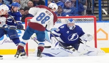 Tampa Bay Lightning goaltender Andrei Vasilevskiy (88) makes a save on a shot by Colorado Avalanche center Martin Necas (88) during the second period of an NHL hockey game Tuesday, Jan. 6, 2026, in Tampa, Fla. (AP Photo/Chris O'Meara)