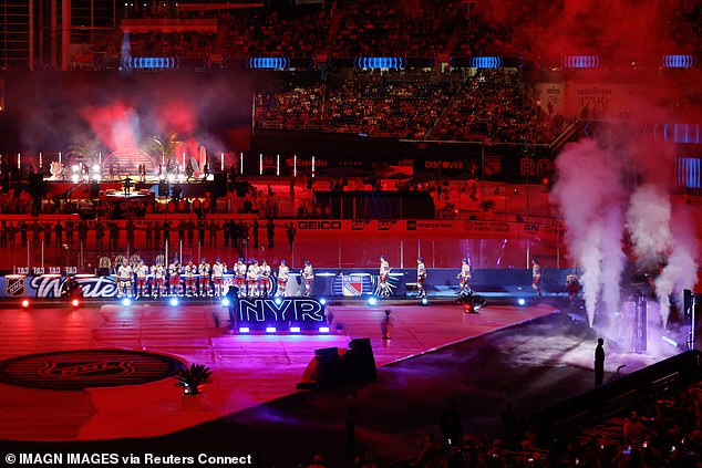 Fonsi stood center stage as he performed while the players made their way to the ice