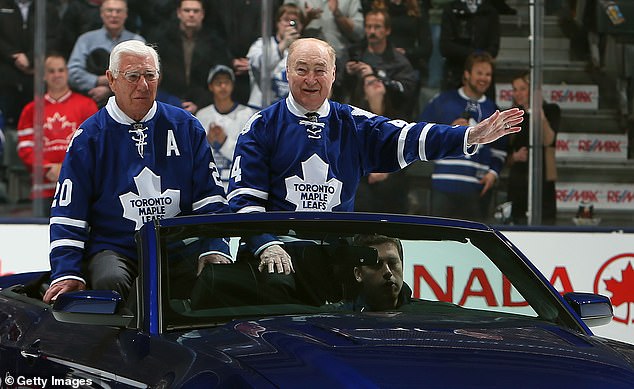 Pulford (L) is honored alongside Red Kelly on the 50th anniversary of the 1963 Stanley Cup win