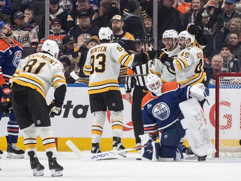 The Boston Bruins celebrate a goal as Edmonton Oilers goaltender Connor Ingram looks on during second-period NHL action in Edmonton on Wednesday, Dec. 31, 2025.