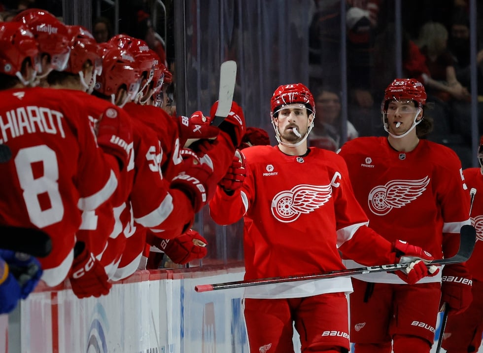 Detroit Red Wings center Dylan Larkin, second from right, celebrates his second period goal...