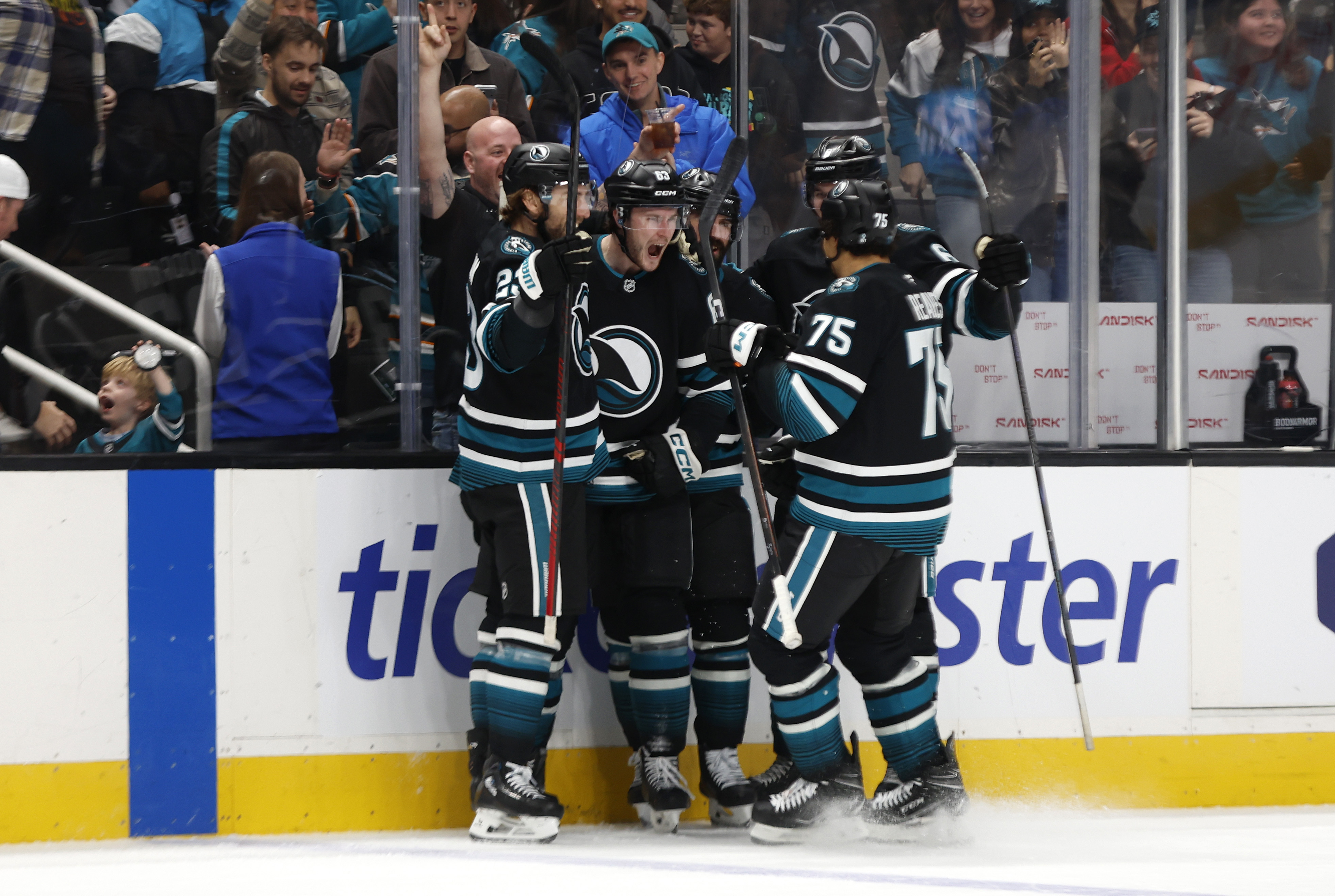 San Jose Sharks’ Zack Ostapchuk (63) celebrates his goal against...