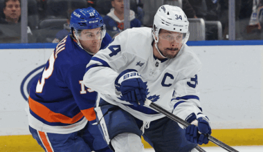 Toronto Maple Leafs center Auston Matthews (34) skates with the puck against the New York Islanders during the overtime at UBS Arena.
