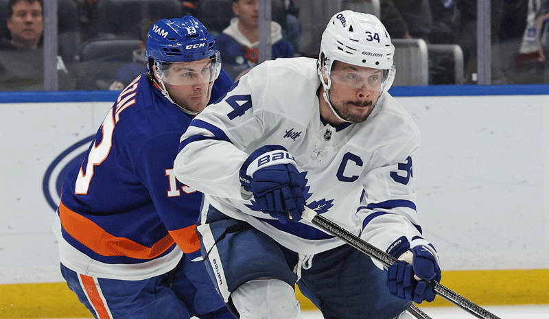 Toronto Maple Leafs center Auston Matthews (34) skates with the puck against the New York Islanders during the overtime at UBS Arena.