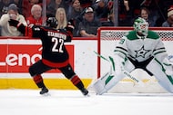 Carolina Hurricanes' Logan Stankoven (22) scores a goal against Dallas Stars' Jake Oettinger...