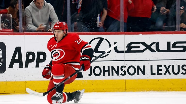 Carolina Hurricanes' Logan Stankoven (22) celebrates his goal against the...