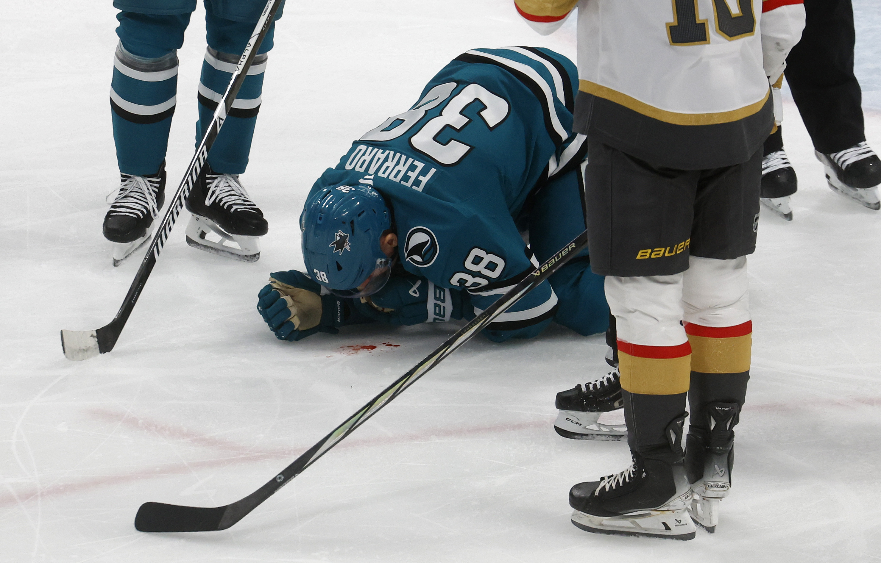 San Jose Sharks' Mario Ferraro (38) is injured during their...