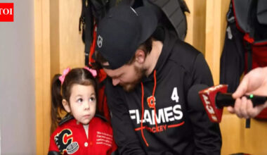 Johnny Gaudreau’s daughter Noa steals a cute moment with Rasmus Andersson at Calgary Flames media availability | NHL News