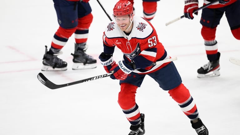 Washington Capitals center Ethen Frank (53) reacts as he skates...