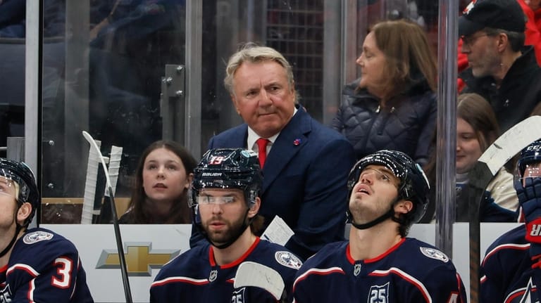 Columbus Blue Jackets head coach Rick Bowness watches his team...