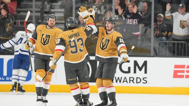 Vegas Golden Knights right wing Pavel Dorofeyev, right, celebrates his...