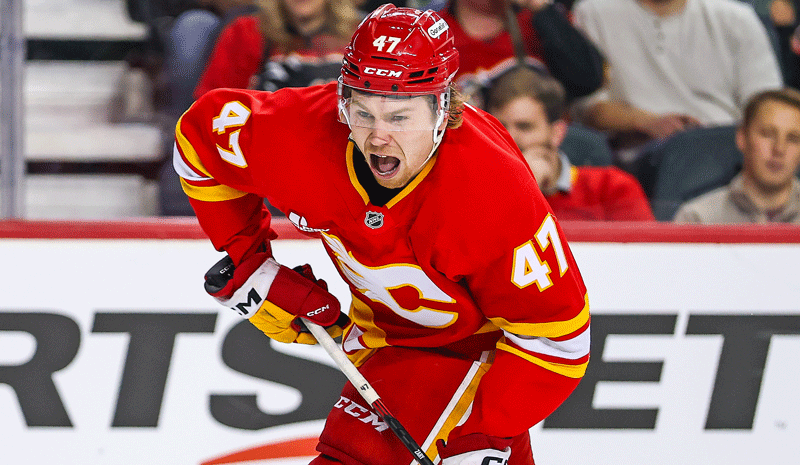 Calgary Flames center Connor Zary (47) shoots the puck against the Detroit Red Wings during the second period at Scotiabank Saddledome.