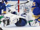 Vancouver Canucks goaltender Thatcher Demko looks for the puck in traffic during the first period against the Buffalo Sabres on Jan. 6, 2026, in Buffalo, N.Y.