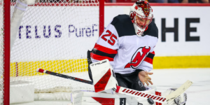 Jacob Markstrom makes a bare-handed save for the New Jersey Devils in the second period against the Calgary Flames on Monday night.