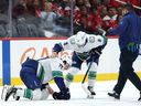 Centre Filip Chytil of the Vancouver Canucks was slow to rise after being drilled and concussed on a brutal hit by Capitals forward Tom Wilson on Oct. 19 in Washington, D.C. Chytil says he just hasn't had as many concussions as people claim online.