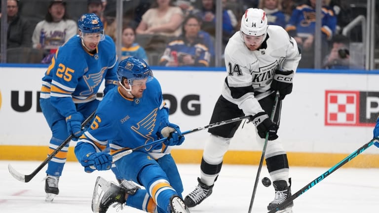 St. Louis Blues' Philip Broberg (6) and Los Angeles Kings'...
