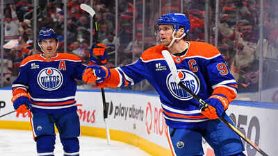 Connor McDavid overtakes Nathan MacKinnon for scoring lead with five-point night in Oilers' overtime Win