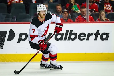 Dougie Hamilton, NJ Devils Defenseman carries the puck