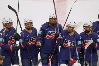 US's Taylor Heise (27), Lacey Eden (7), Laila Edwards (10) Caroline Harvey (4) and Haley Winn (8) celebrate with teammates after the US defeated Canada in a Rivalry Series women's hockey game Thursday, Nov. 6, 2025, in Cleveland. (AP Photo/Sue Ogrocki, File)