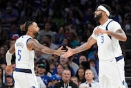 Dallas Mavericks guard D'Angelo Russell (5) celebrates with forward/center Anthony Davis (3)...