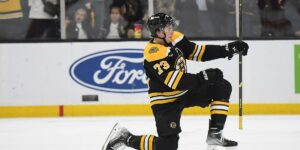 Charlie McAvoy #73 skating for the Boston Bruins