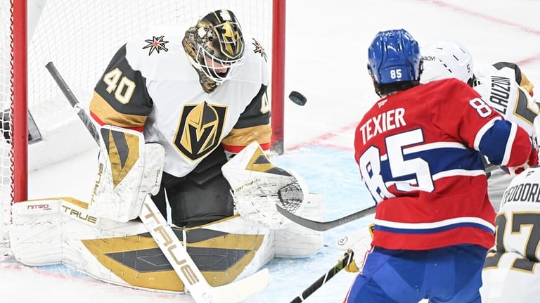 Montreal Canadiens' Alexandre Texier (85) takes a shot on Vegas...