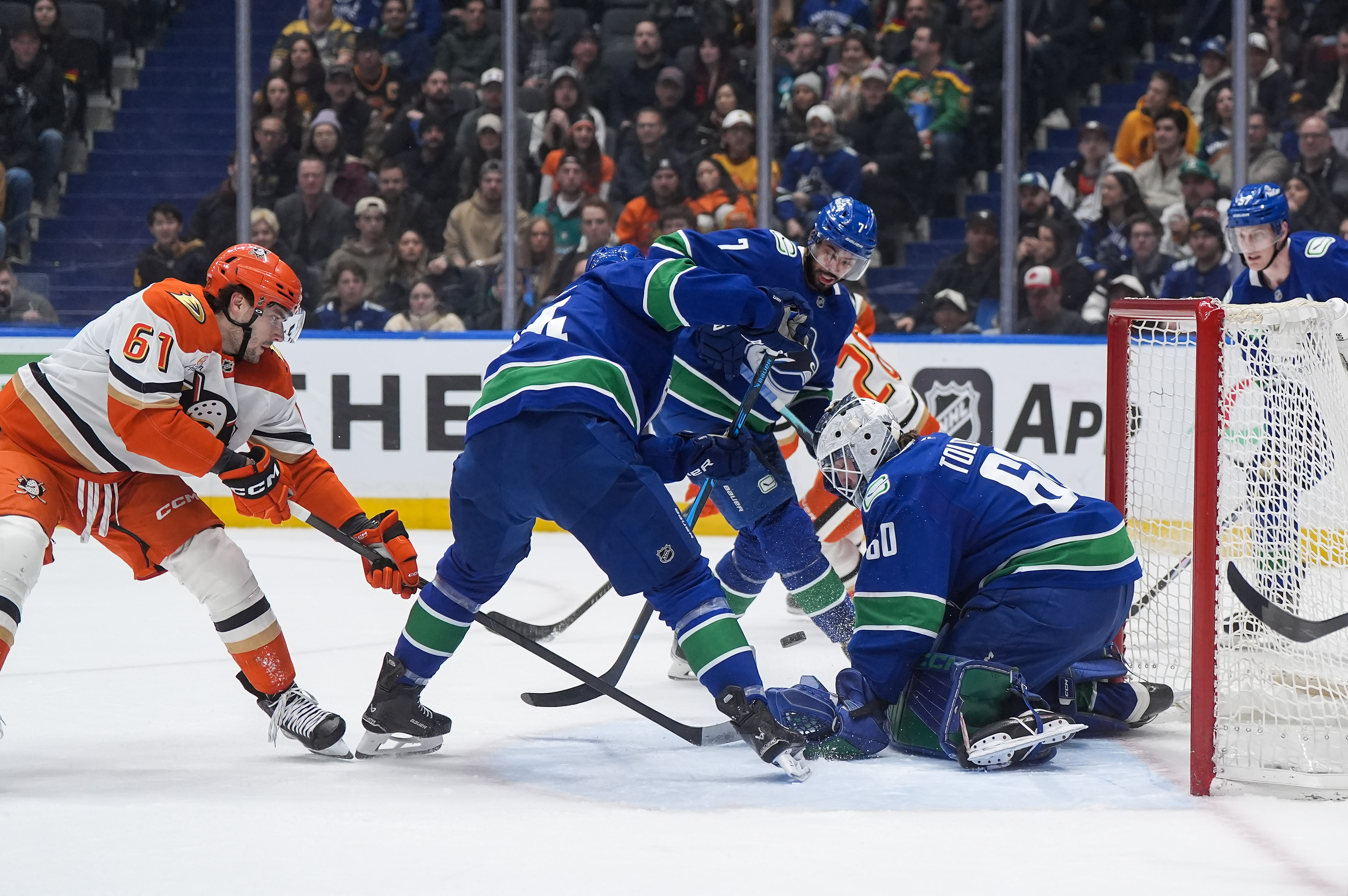 Vancouver Canucks goalie Nikita Tolopilo (60) stops the Ducks’ Cutter...