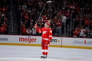 Detroit Red Wings right wing Patrick Kane acknowleges the fans after recording his 1,375th...