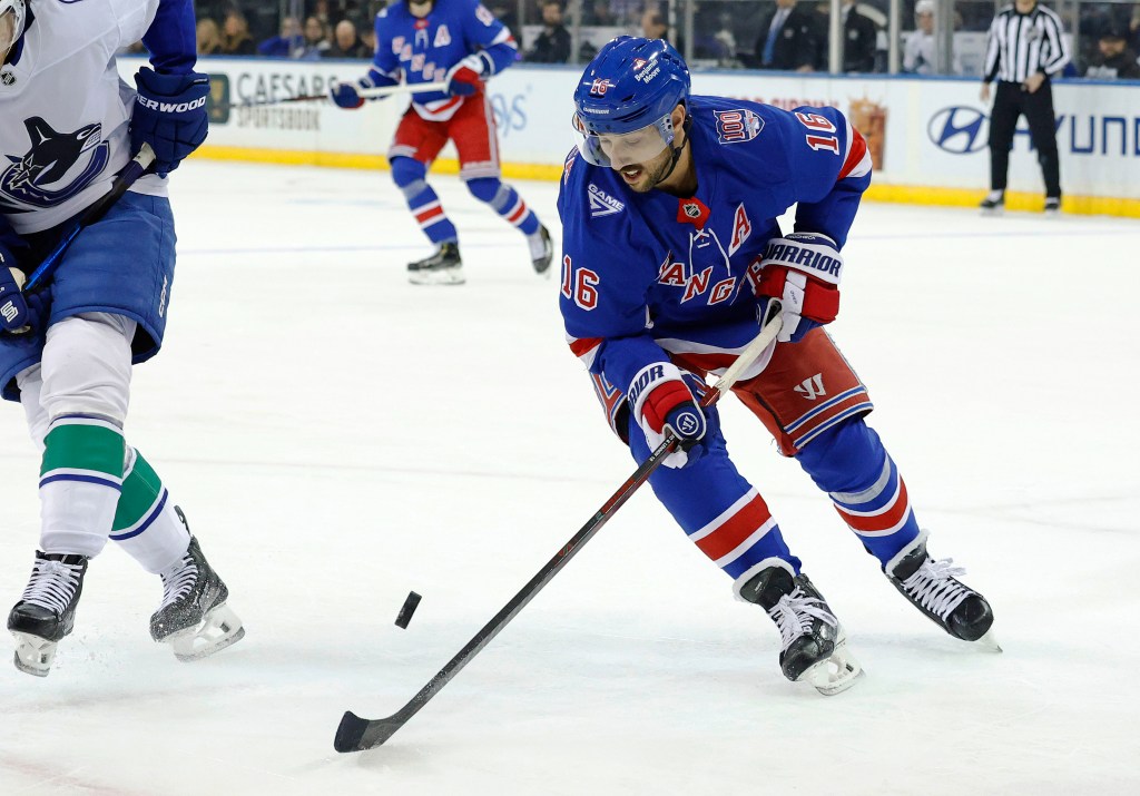 New York Rangers center Vincent Trocheck (16) tries to maintain possession during the first period when the New York Rangers played the Vancouver Canucks Tuesday, December 16, 2025 at Madison Square Garden in Manhattan, NY.