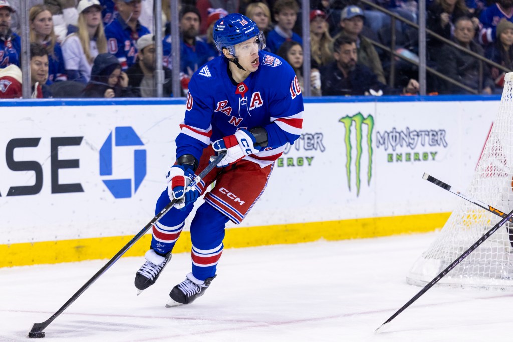 New York Rangers left wing Artemi Panarin (10) moves the puck behind the net in the third period at Madison Square Garden, Saturday, Dec. 20, 2025, in New York, NY.