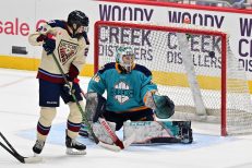 WASHINGTON DC, JANUARY 18: Forward Shiann Darkangelo (27) of the Montreal Victoire sets a screen in front of Goaltender Kayle Osborne (82) of the New York Sirens to help Montreal Victoire even the score at 1 during the first period of the PWHL Takeover Tour game between the Montreal Victoire and New York Sirens on January 18, 2026 at Capital One Arena in Washington, DC. (Photo: Robert Raymer)