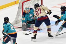 WASHINGTON DC, JANUARY 18: Goaltender Kayle Osborne (82) of the New York Sirens makes a stop in close on Forward Shiann Darkangelo (27) of the Montreal Victoire during the second period of the PWHL Takeover Tour game between the Montreal Victoire and New York Sirens on January 18, 2026 at Capital One Arena in Washington, DC. (Photo: Robert Raymer)