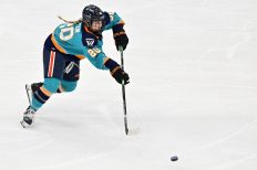 WASHINGTON DC, JANUARY 18: Defender Allyson Simpson (20) of the New York Sirens passes the puck up ice during the second period of the PWHL Takeover Tour game between the Montreal Victoire and New York Sirens on January 18, 2026 at Capital One Arena in Washington, DC. (Photo: Robert Raymer)