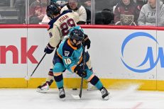 WASHINGTON DC, JANUARY 18: Forward Sarah Fillier (10) of the New York Sirens and Forward Marie-Philip Poulin (29) of the Montreal Victoire battle along the boards during the second period of the PWHL Takeover Tour game between the Montreal Victoire and New York Sirens on January 18, 2026 at Capital One Arena in Washington, DC. (Photo: Robert Raymer)