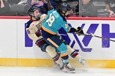WASHINGTON DC, JANUARY 18: Forward Maddi Wheeler (18) of the New York Sirens lays a hit on Forward Hayley Scamurra (16) of the Montreal Victoire during the third period of the PWHL Takeover Tour game between the Montreal Victoire and New York Sirens on January 18, 2026 at Capital One Arena in Washington, DC. (Photo: Robert Raymer)