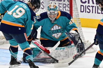 WASHINGTON DC, JANUARY 18: Goaltender Kayle Osborne (82) of the New York Sirens makes a save with Forward Paetyn Levis (19) in front to help control the rebound during the third period of the PWHL Takeover Tour game between the Montreal Victoire and New York Sirens on January 18, 2026 at Capital One Arena in Washington, DC. (Photo: Robert Raymer)