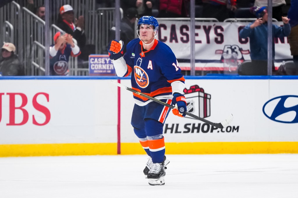 Jean-Gabriel Pageau of the New York Islanders celebrates a play on the ice.