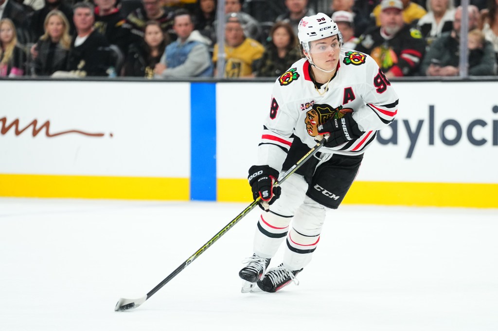 Connor Bedard of the Chicago Blackhawks skates on the ice during a game against the Vegas Golden Knights.
