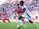 Ali Ahmed of the Vancouver Whitecaps FC runs with the ball during the Audi 2025 MLS Cup Final match between Inter Miami CF and Vancouver Whitecaps FC at Chase Stadium on December 06, 2025 in Fort Lauderdale, Florida.