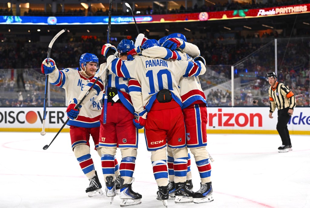 Artemi Panarin #10 of the New York Rangers celebrates with teammates after scoring a goal during the third period of the 2026 Discover NHL Winter Classic game between the New York Rangers and the Florida Panthers at loanDepot park on January 02, 2026 in Miami, Florida.
