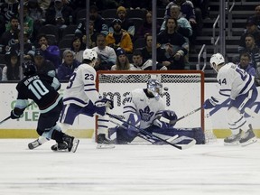 Matty Beniers #10 of the Seattle Kraken scores