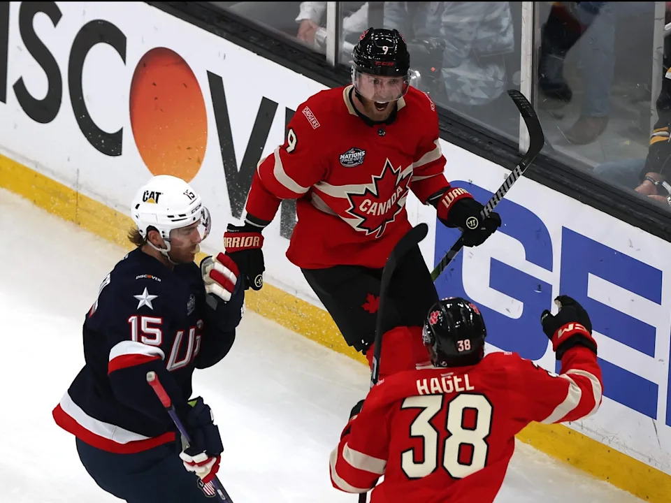  Sam Bennett of Team Canada celebrates with Brandon Hagel after scoring a goal against Connor Hellebuyck of Team United States during the second period in the NHL 4 Nations Face-Off Championship Game at TD Garden on Feb. 20, 2025, in Boston, Mass.