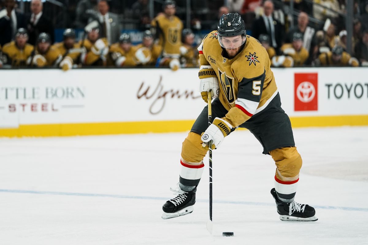 Vegas Golden Knights defenseman Jeremy Lauzon (5) maintains possession of the puck during second period of NHL game against Nashville Predators on Wed. Dec. 31, 2025 at T-Mobile Arena in Las Vegas. Vegas Golden Knights defenseman Jeremy Lauzon (5) maintains possession of the puck during second period of NHL game against Nashville Predators on Wed. Dec. 31, 2025 at T-Mobile Arena in Las Vegas.