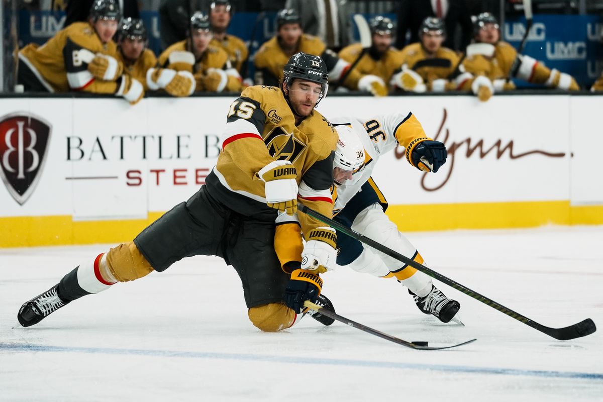 Vegas Golden Knights defensemen Noah Hanifin (15) and Predators left wing Cole Smith (36) collide going after the puck during second period of NHL game against Nashville Predators on Wed. Dec. 31, 2025 at T-Mobile Arena in Las Vegas. Vegas Golden Knights defensemen Noah Hanifin (15) and Predators left wing Cole Smith (36) collide going after the puck during second period of NHL game against Nashville Predators on Wed. Dec. 31, 2025 at T-Mobile Arena in Las Vegas.