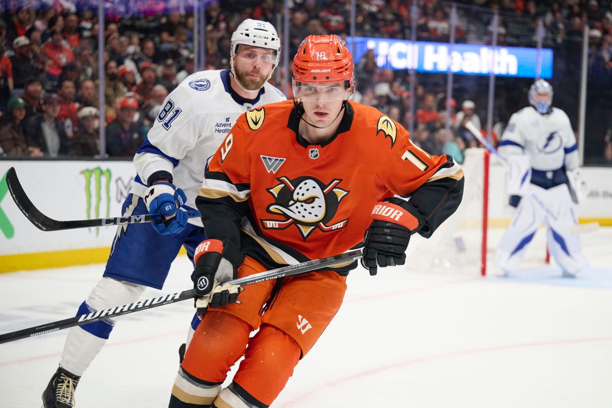Anaheim Ducks right wing Troy Terry (19) fights for the puck against the lightning at the Honda Center on December 31,2025 in Anaheim, California. Anaheim Ducks right wing Troy Terry (19) fights for the puck against the lightning at the Honda Center on December 31,2025 in Anaheim, California.