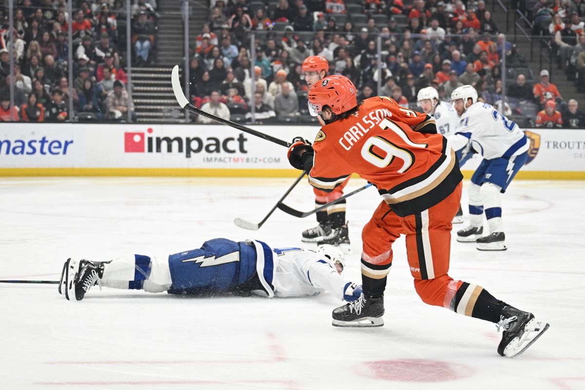 Anaheim Ducks center Leo Carlsson (91) shoots a goal attempt against the Lightning at the Honda Center on December 31,2025 in Anaheim, California. Anaheim Ducks center Leo Carlsson (91) shoots a goal attempt against the Lightning at the Honda Center on December 31,2025 in Anaheim, California.