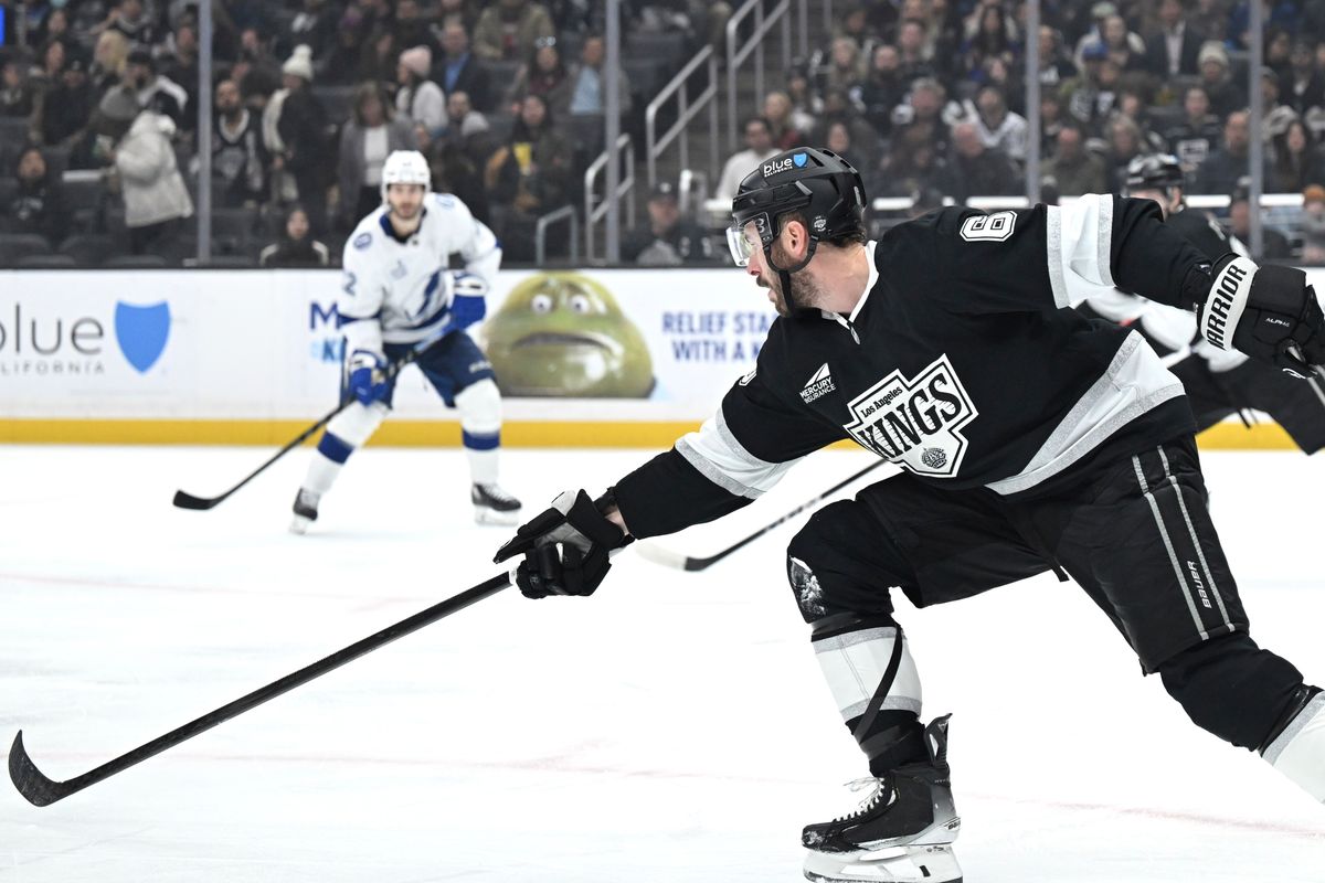 The Los Angeles Kings defender Joel Edmundson (6) reaches to defend against the lightning at the Crypto Arena on January 1st, 2026 in Los Angeles  California.