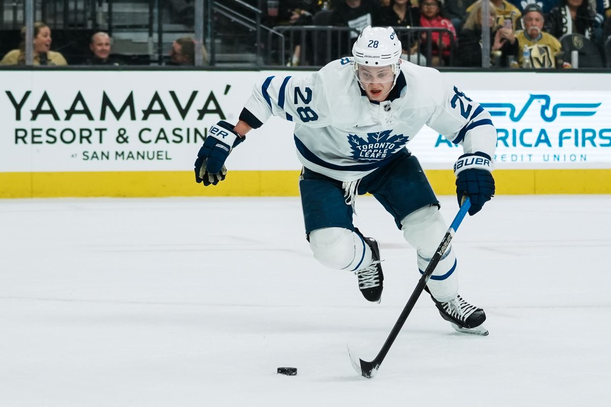 Toronto Maple Leafs defenseman Troy Stecher (28) skates the puck down the ice during first period of NHL game against Vegas Golden Knights on Thursday Jan. 15, 2026 at T-Mobile Arena in Las Vegas.