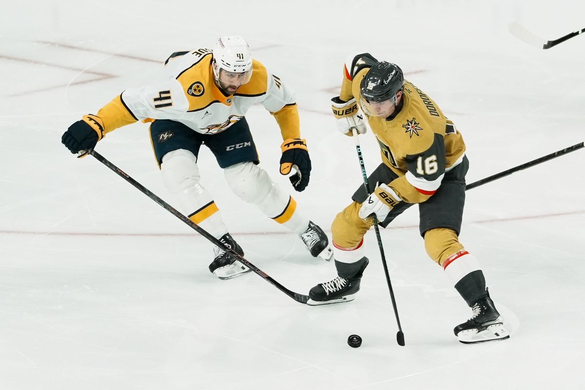 Vegas Golden Knights right wing Pavel Dorofeyev (16) states the puck down the ice while attempting to get past Nashville Predators defensemen Nicolas Hague (41) during first period of NHL game against Nashville Predators on Saturday Jan. 17, 2026 at T-Mobile Arena in Las Vegas.